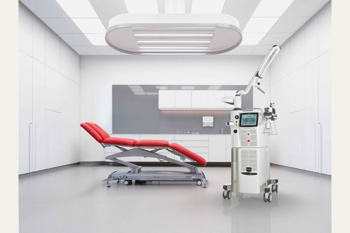 Supplied photograph of the Fotona SP Dynamis NX Line platform in a clinical treatment room